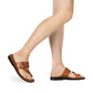 Model wearing Ezra Honey, handmade leather slide sandals with toe loop - Side View