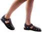 Model wearing Barak Black, handmade leather sandals fisherman sandal silhouette