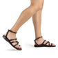Jade brown, handmade leather sandals with back strap and toe loop - model View