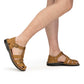 Model wearing Daniel Tan Nubuck closed toe leather sandal - side view
