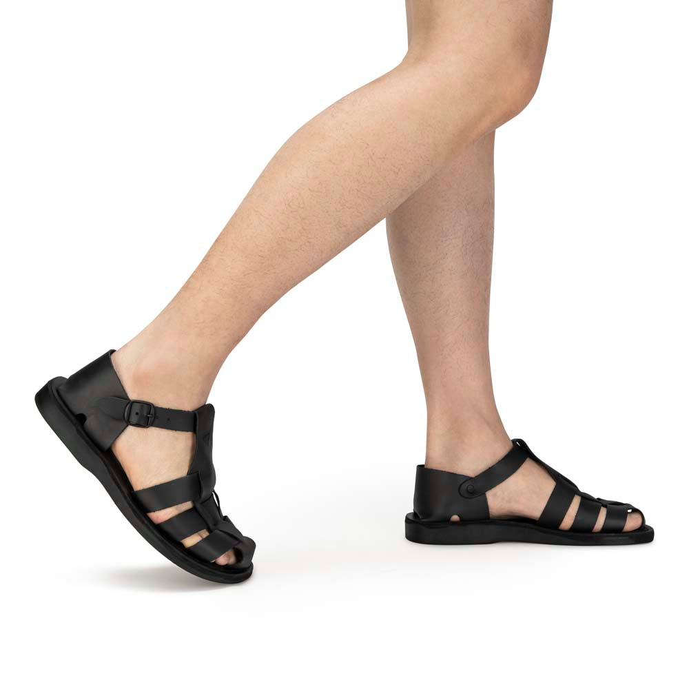 Model wearing Daniel Black closed toe leather sandal - side view