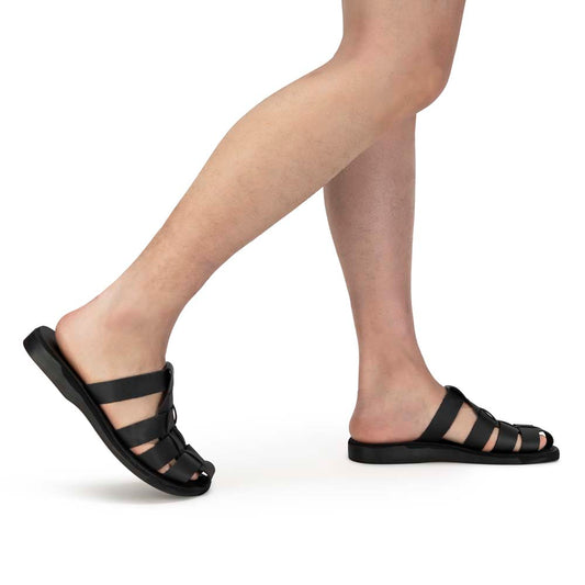 Model wearing Michael Slide Black closed toe leather sandal - Side View