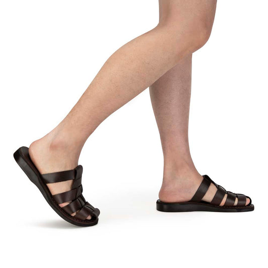 Model wearing Michael Slide Brown closed toe leather sandal - Side View