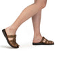 Model wearing Michael Slide Oiled Brown closed toe leather sandal - Side View