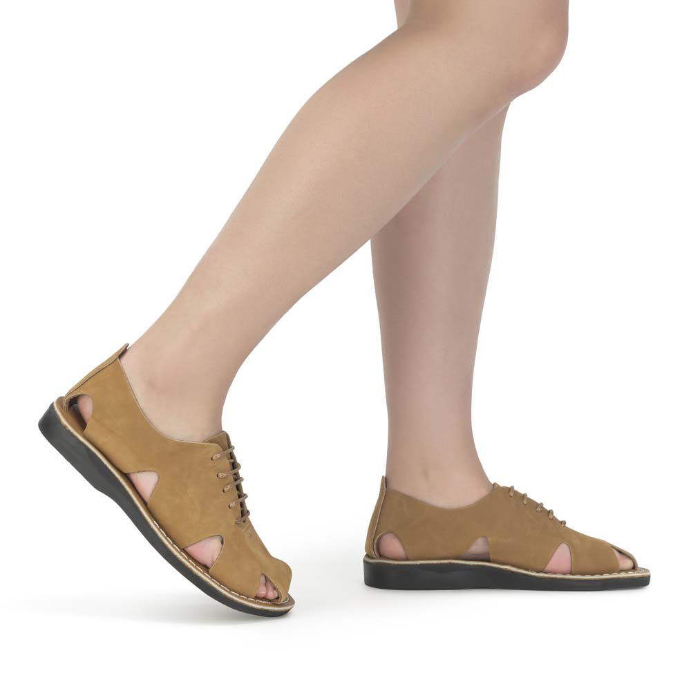 Model wearing River Tan Nubuck leather lace-up sandal - side view