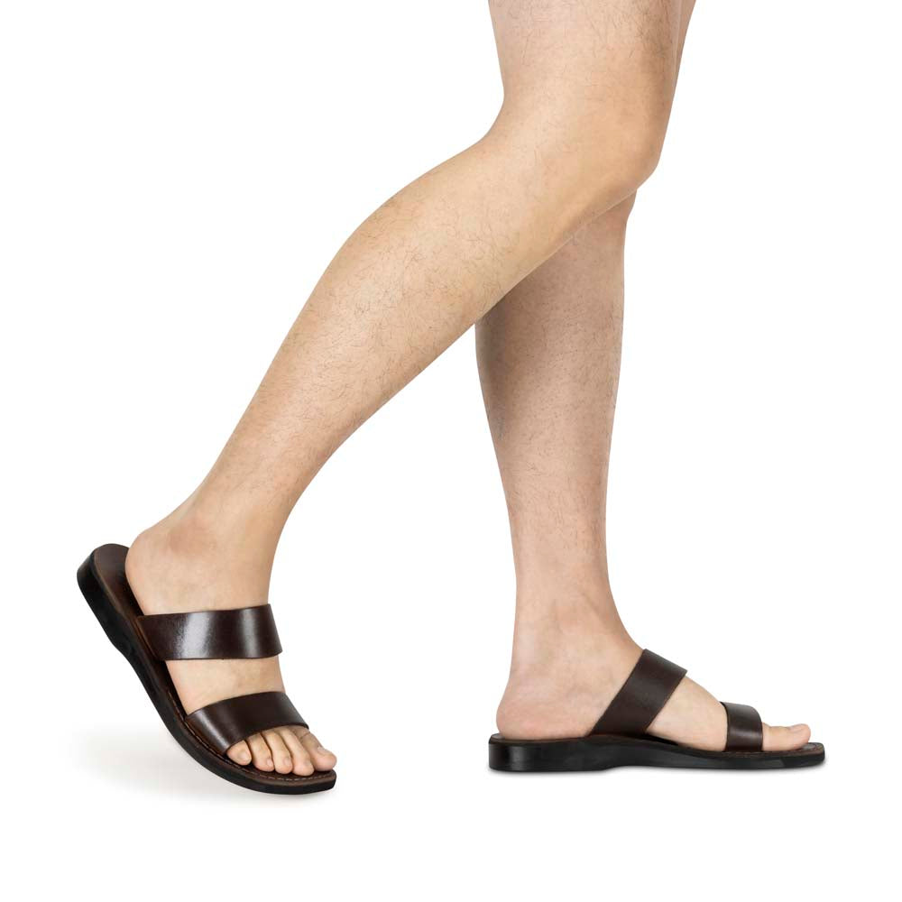 Model wearing Aviv brown, handmade leather slide sandals