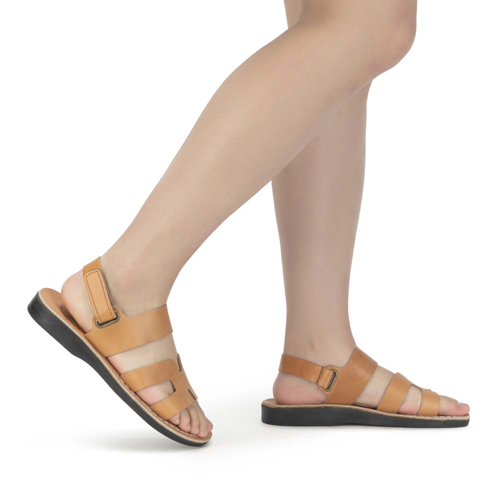 Model wearing Anna - Leather Slingback Flat Sandal | Tan - side view