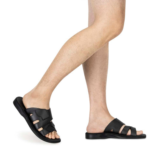 Model wearing Mateo black, handmade leather slide sandals 