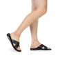 Model wearing Elan black, handmade leather slide sandals