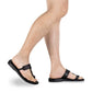 Model wearing David black, handmade leather slide sandals with toe loop