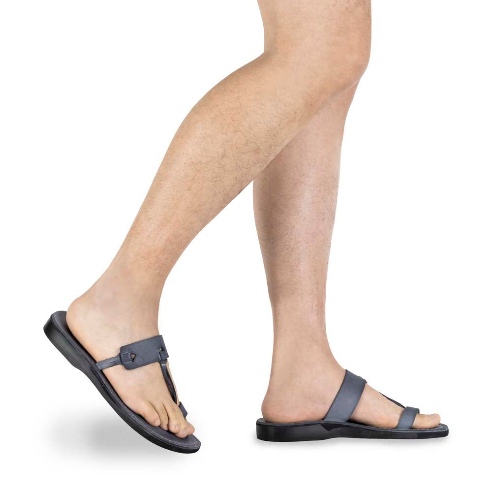 Model wearing David gray, handmade leather slide sandals with toe loop