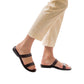 Model wearing Ada brown, handmade leather slide sandals 