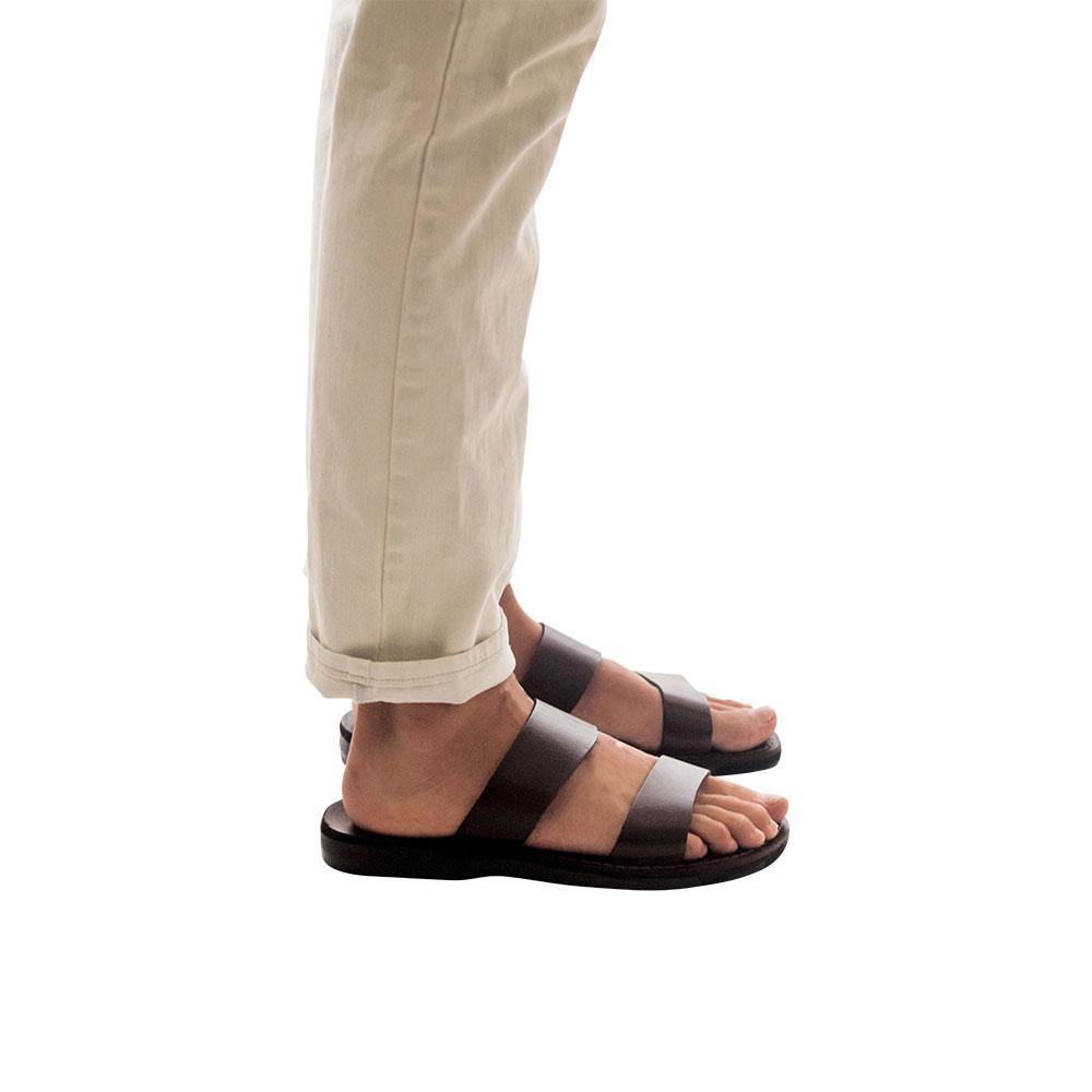 Model wearing Aviv brown, handmade leather slide sandals 