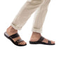 Model wearing Aviv brown, handmade leather slide sandals 