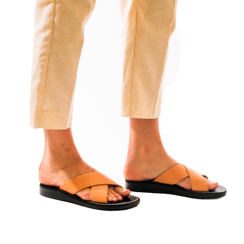 Model wearing Elan black tan, handmade leather slide sandals