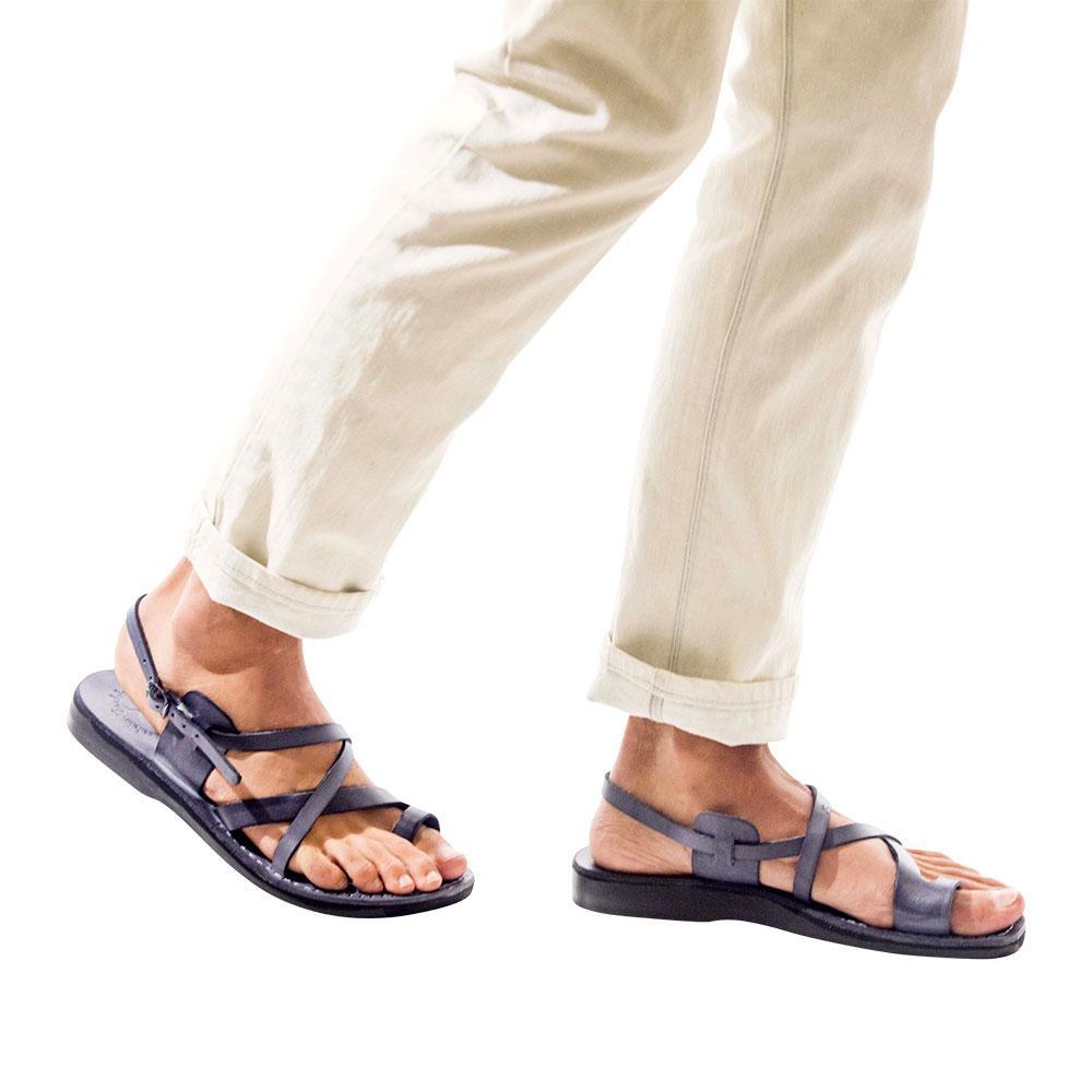 Model wearing The Good Shepherd Buckle gray, handmade leather sandals with back strap and toe loop